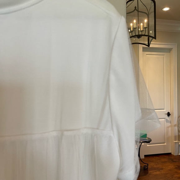 Tiers of tulle are layered atop a perfectly-cut T-shirt with added lace accents. - Picture 9 of 10